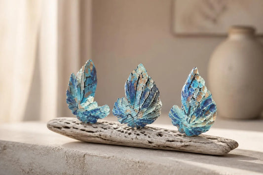 Carved shells on wood and hand painted.